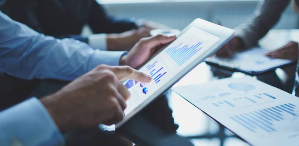 close up of a person using a finger on an tablet